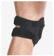 Adjustable black open-patella knee brace worn on the leg