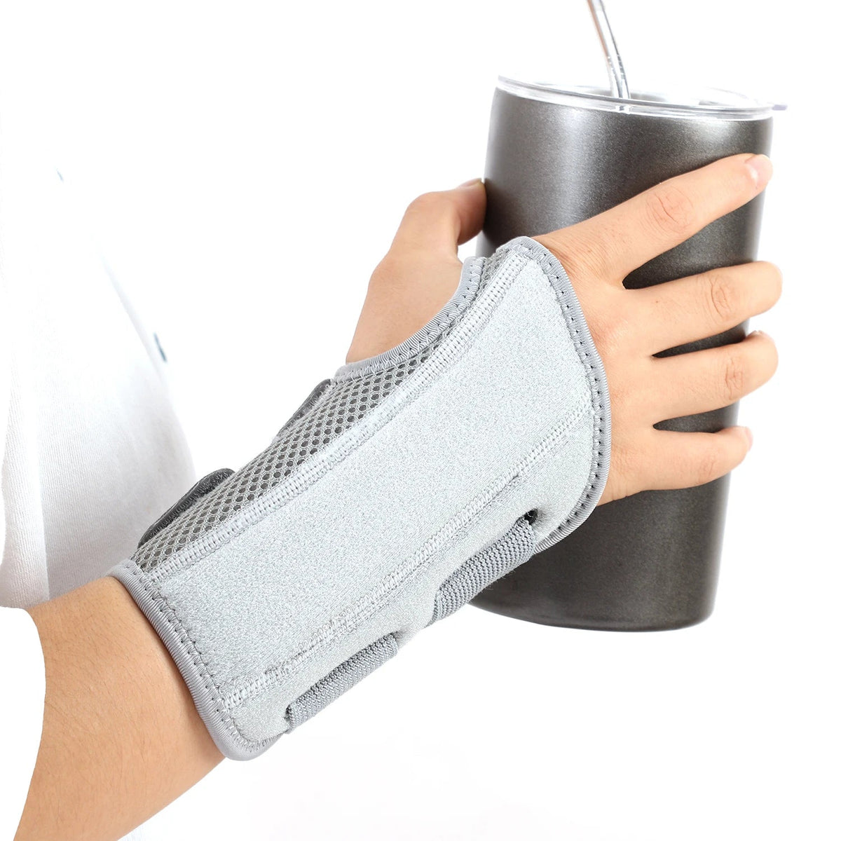 Adjustable wrist support brace included in the wrist and massage recovery bundle